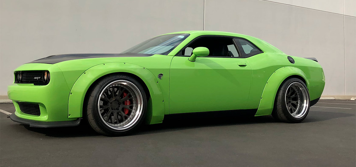 2018 Challenger SRT<sup>®</sup> Hellcat Widebody” width=”1170″ height=”600″></a></h3>
<p>Before Dodge came out with the 2018 Challenger SRT<sup>®</sup> Hellcat Widebody, the owner of this ’15 Hellcat decided to build his own. Using an aftermarket fender flare kit and custom wheel sizes, this Challenger is painted in Sublime Green and won’t sneak up on anyone. It bid up to $50,000, where it currently sits in Mecum’s “The Bid Goes On.”</p>
<p> </p>
<div class=