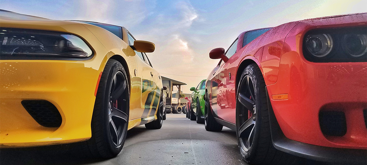 Line of Dodge Thrill Ride cars in rainbow of colors