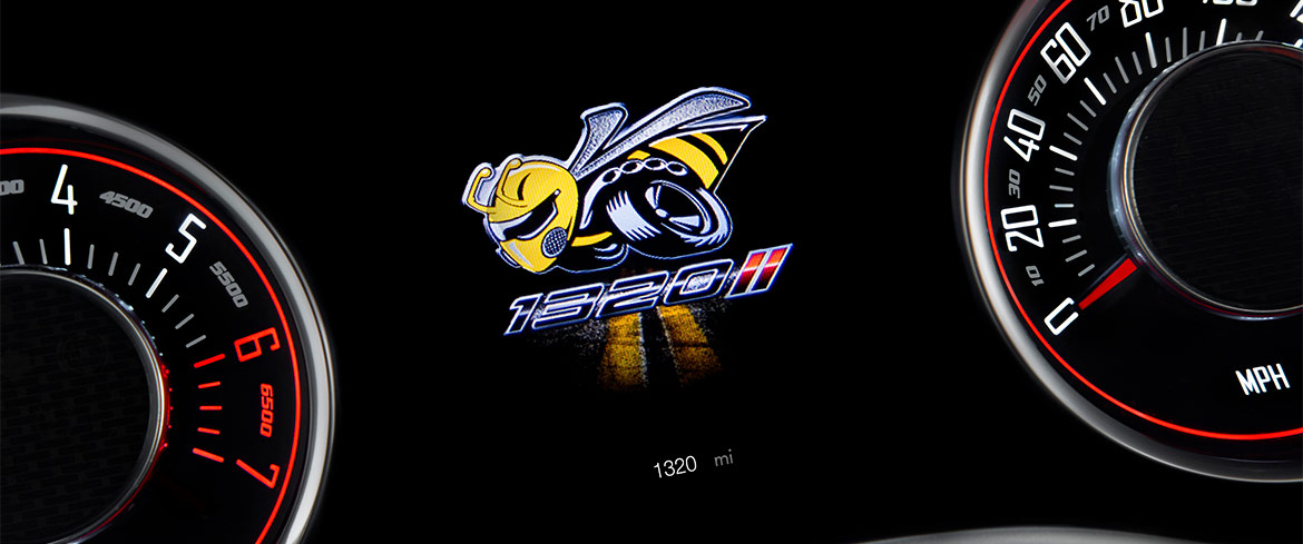 Dash cluster of 1320 Challenger Drag Pak with Angry Bee logo lit up