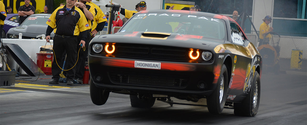 Leah Pritchett in her Challenger Drag Pak launching off the start line