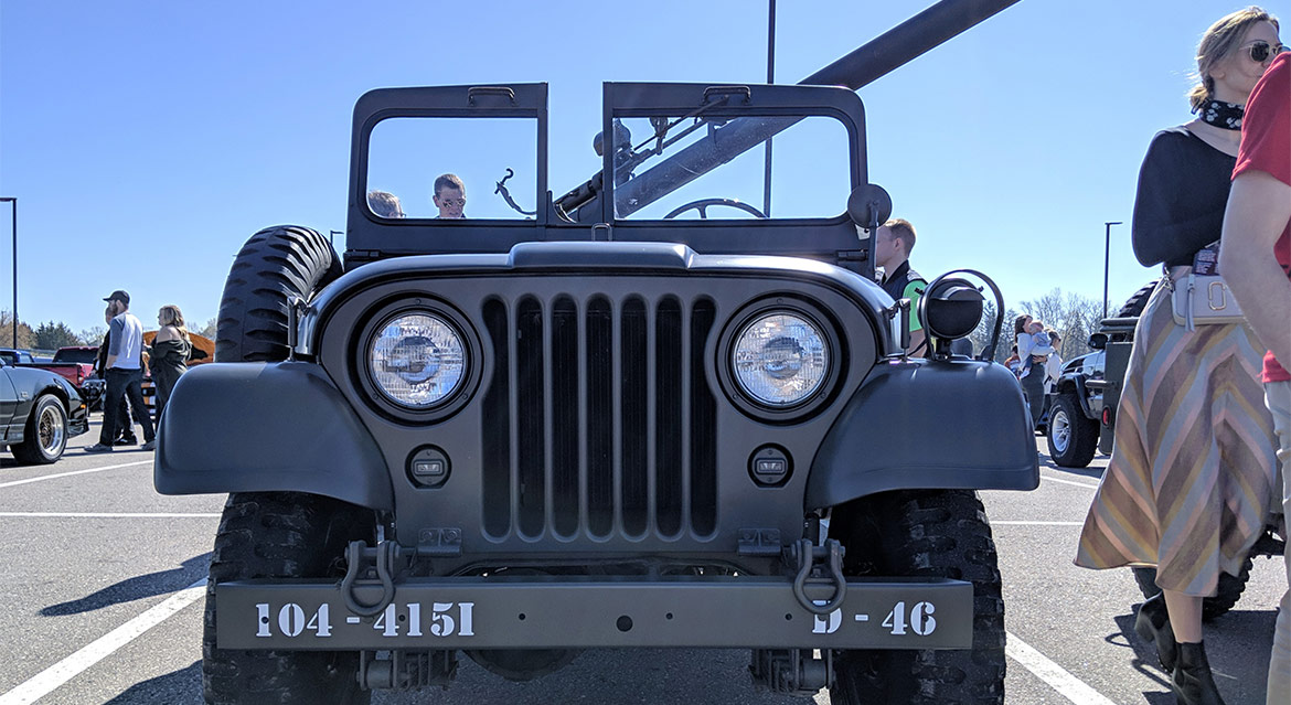 front of a Jeep military vehicle