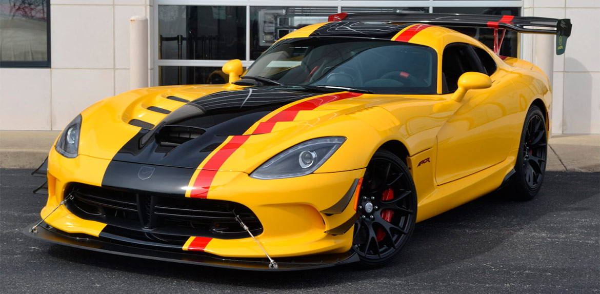 Yellow 2016 Dodge Viper ACR with black and red racing stripes