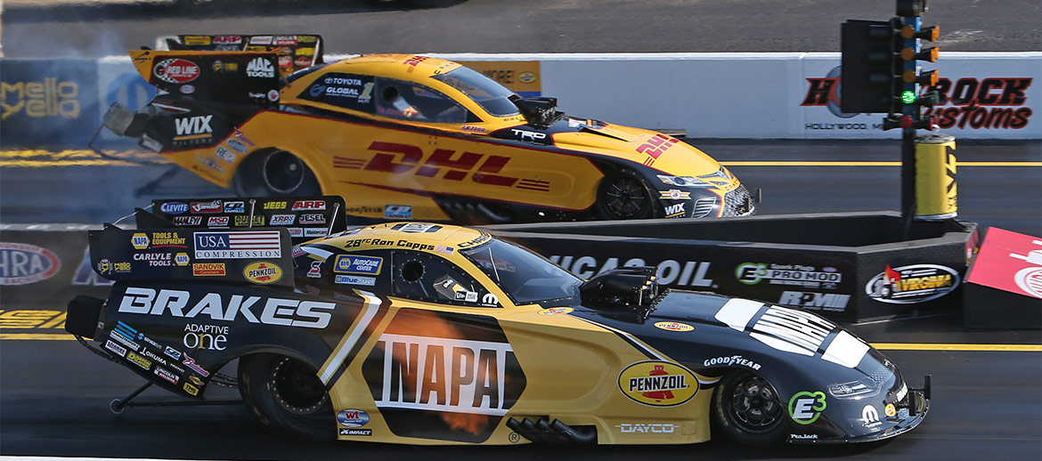 Ron Capps racing his Dodge Challenger SRT Hellcat funny car at the NHRA Virginia Nationals