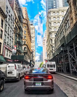 Charger Stars & Stripes driving towards Freedom tower