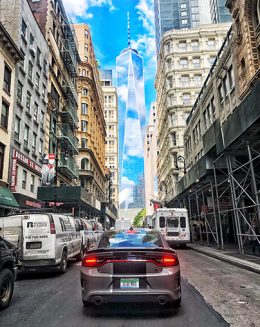 Charger Stars & Stripes driving towards Freedom tower