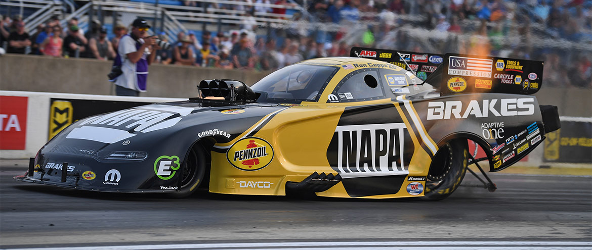 Napa Auto Parts Dodge Charger Hellcat Funny Car racing down the track