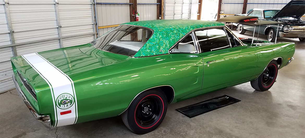 Green mod top Super Bee on display at Mopars in the Park