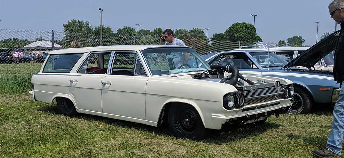 Rows of classic Dodge vehicles at Mopars in the Park