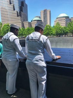 united states soldiers looking over the edge of ground zero