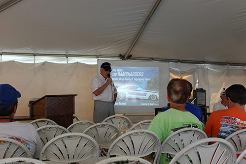 man speaking to a crowd