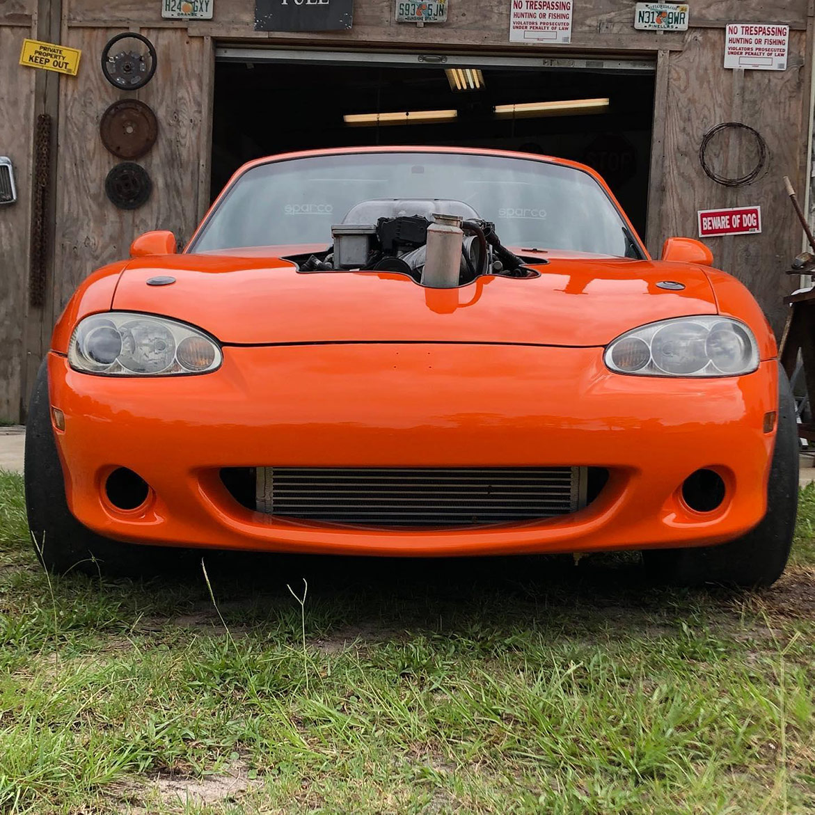 an orange vehicle parked outside