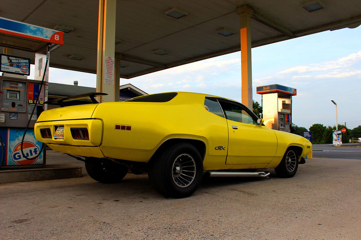 1971 Plymouth GTX at gas pump