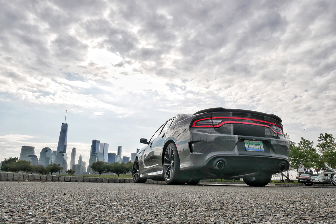a gray charger with the city skyline in the background