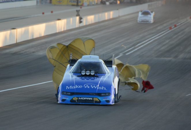 funny car with with parachutes coming out of it