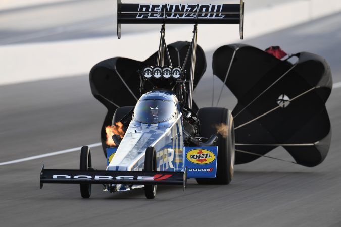 top fuel dragster with parachutes