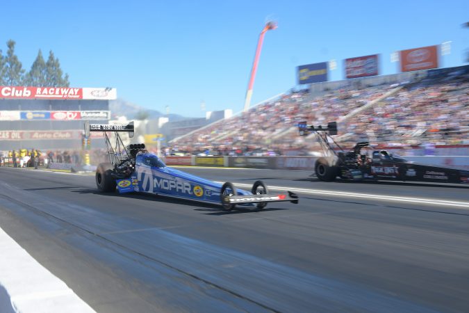 top fuel dragster on the drag strip