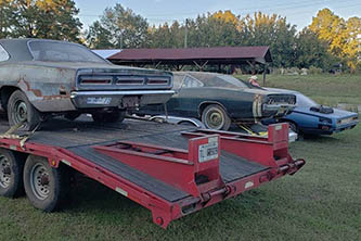 Row of three old Mopar barn finds