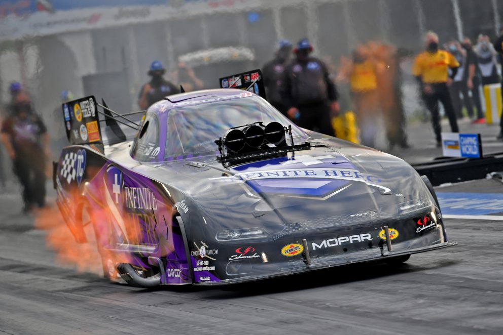 Jack Beckman racing his funny car down the track