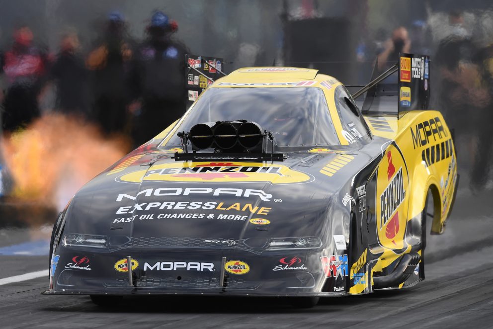 Matt Hagan racing his funny car down the track