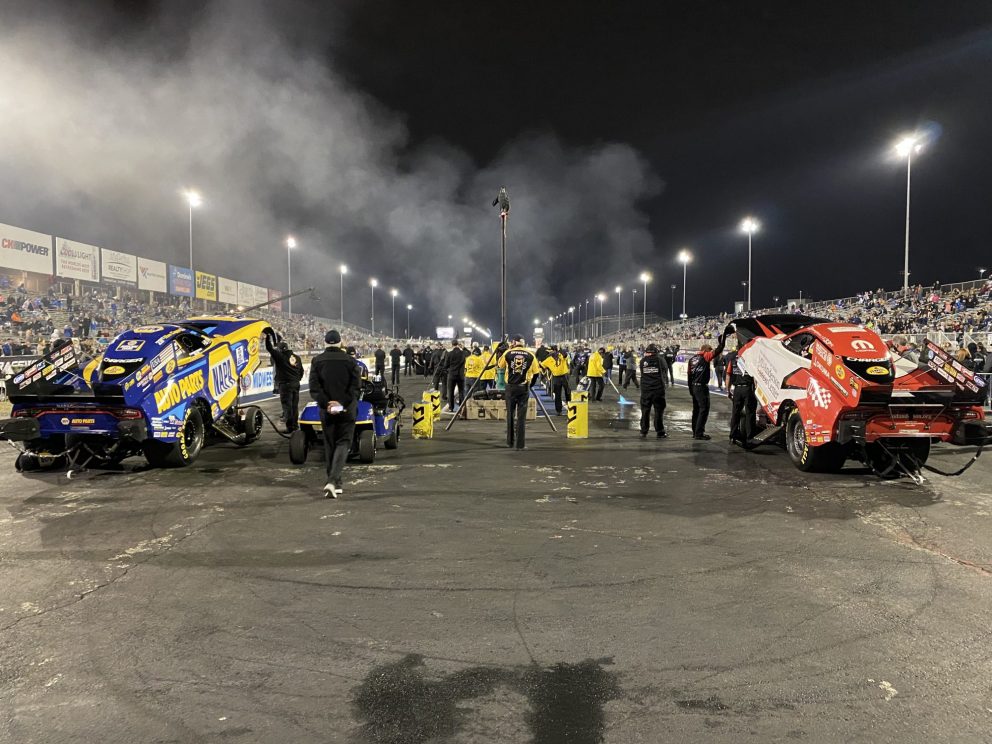 funny cars lined up at the start line