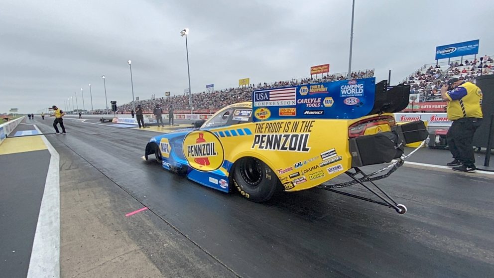 Ron Capps' funny car heading to the start line