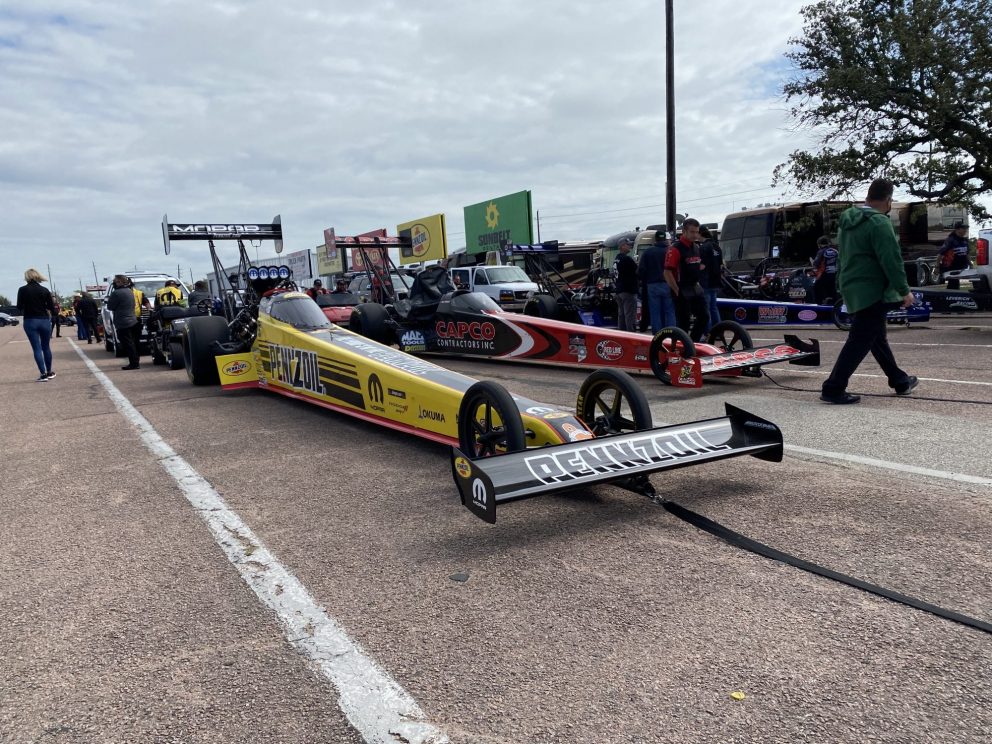 Leah Pruett's top fuel dragster heading to the start line