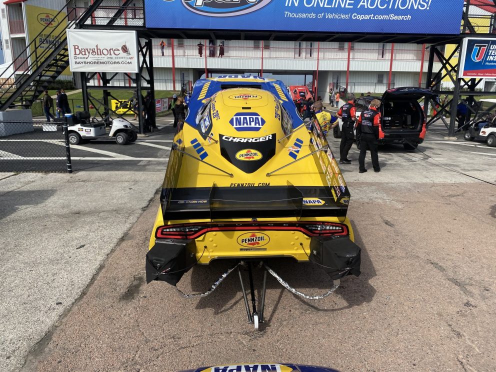 Ron Capps' crew getting his funny car ready to race