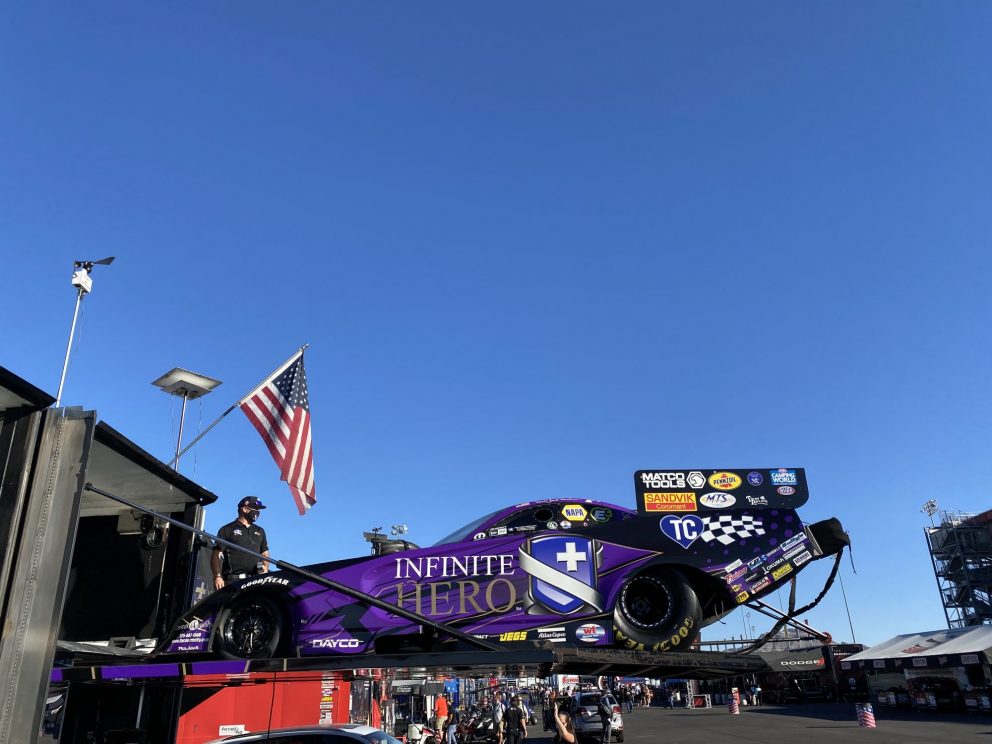 Jack Beckman's funny car being unloaded from the trailer