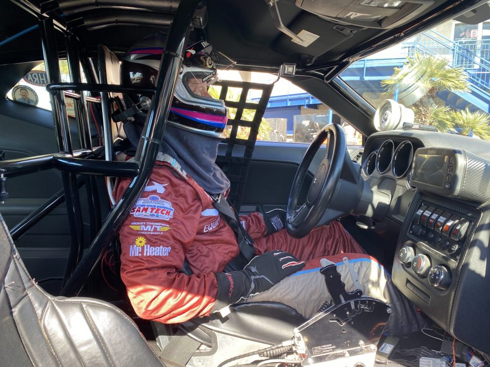 Mark Pawuk sitting in his drag pak ready to race