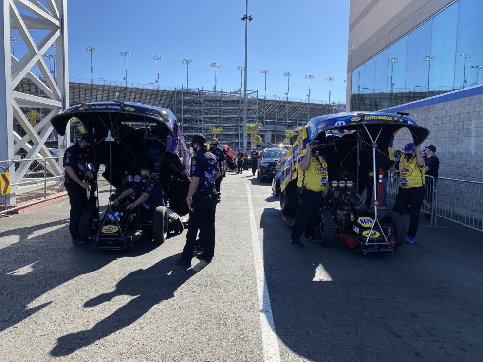 Jack Beckman and Ron Capps' teams working on their funny cars