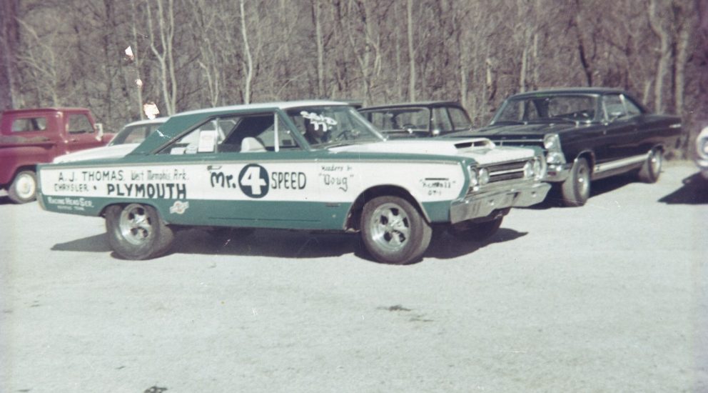 Herb's race car in a parking lot