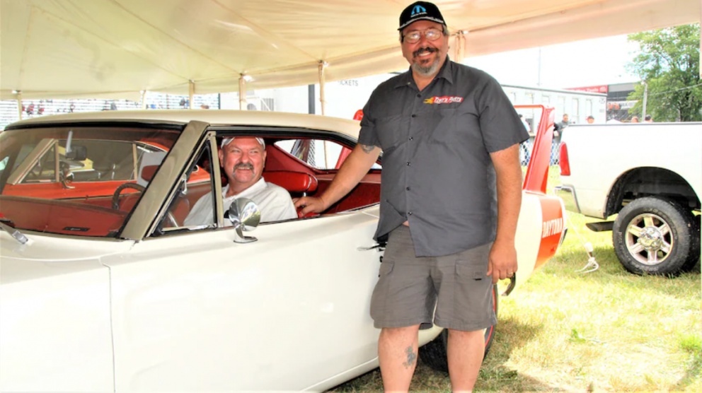 Two men with a 1969 Dodge Daytona