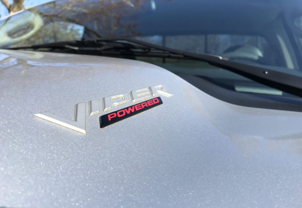 Viper-powered logo on the hood of a 2004 Dodge Ram SRT-10