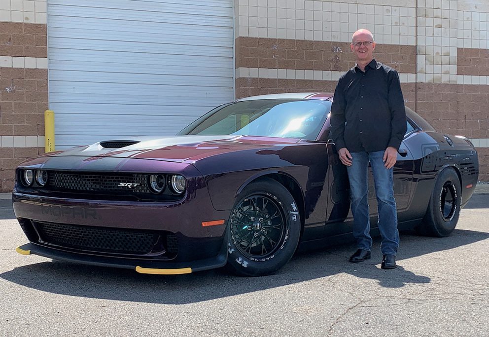 Man with his 2021 Dodge Challenger Mopar Drag Pak