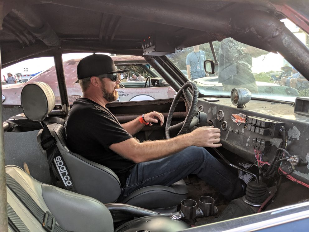 Man in the driver's seat of a vehicle