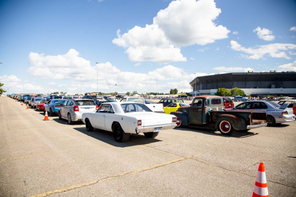 row of cars ready to drag race at Roadkill Nights Powered by Dodge