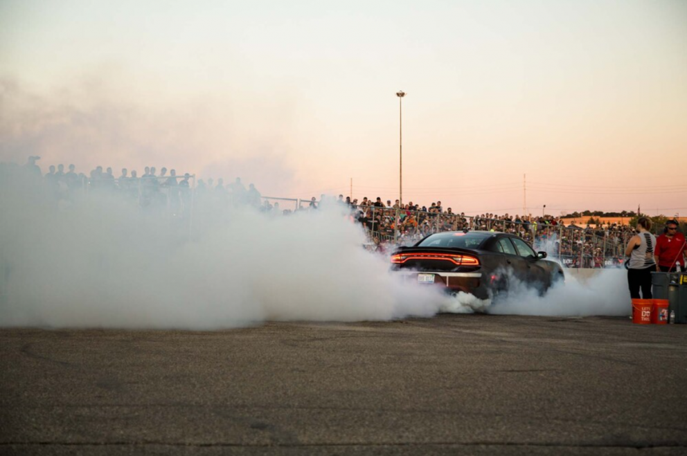 Charger doing a burnout at Roadkill Nights Powered by Dodge