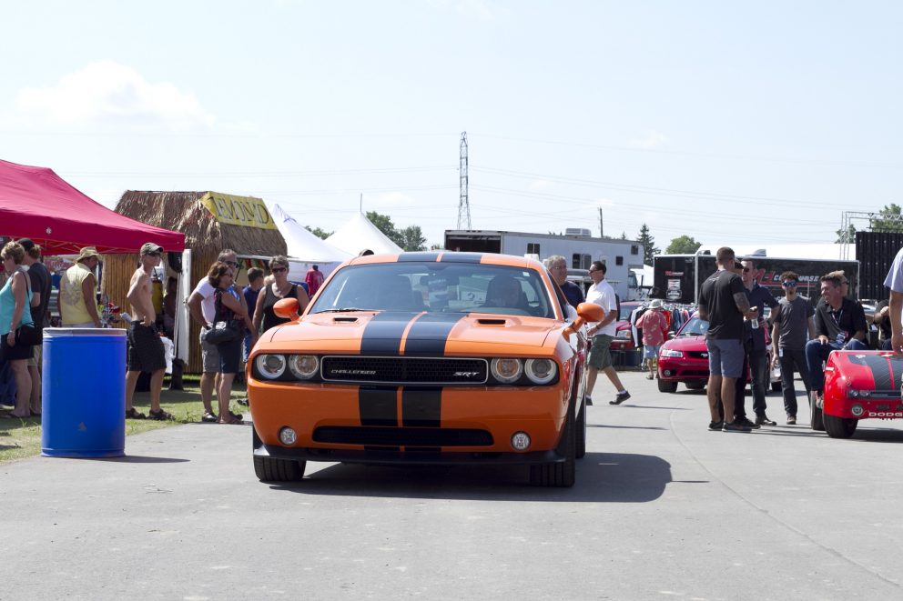 Challenger driving through Roadkill Nights Powered by Dodge