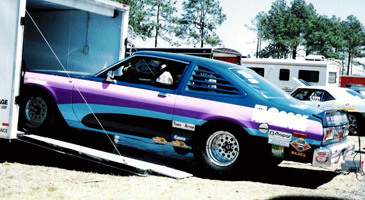 Drag car coming off a trailer
