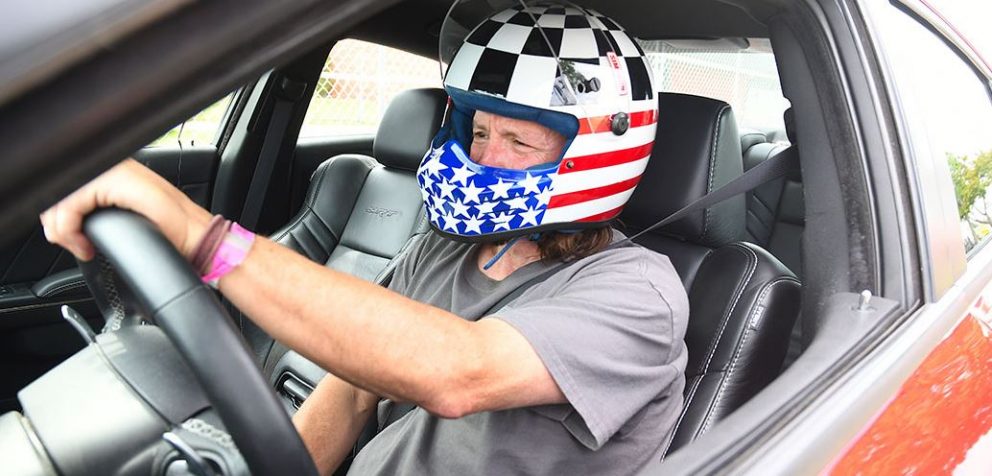 Man sitting in race car