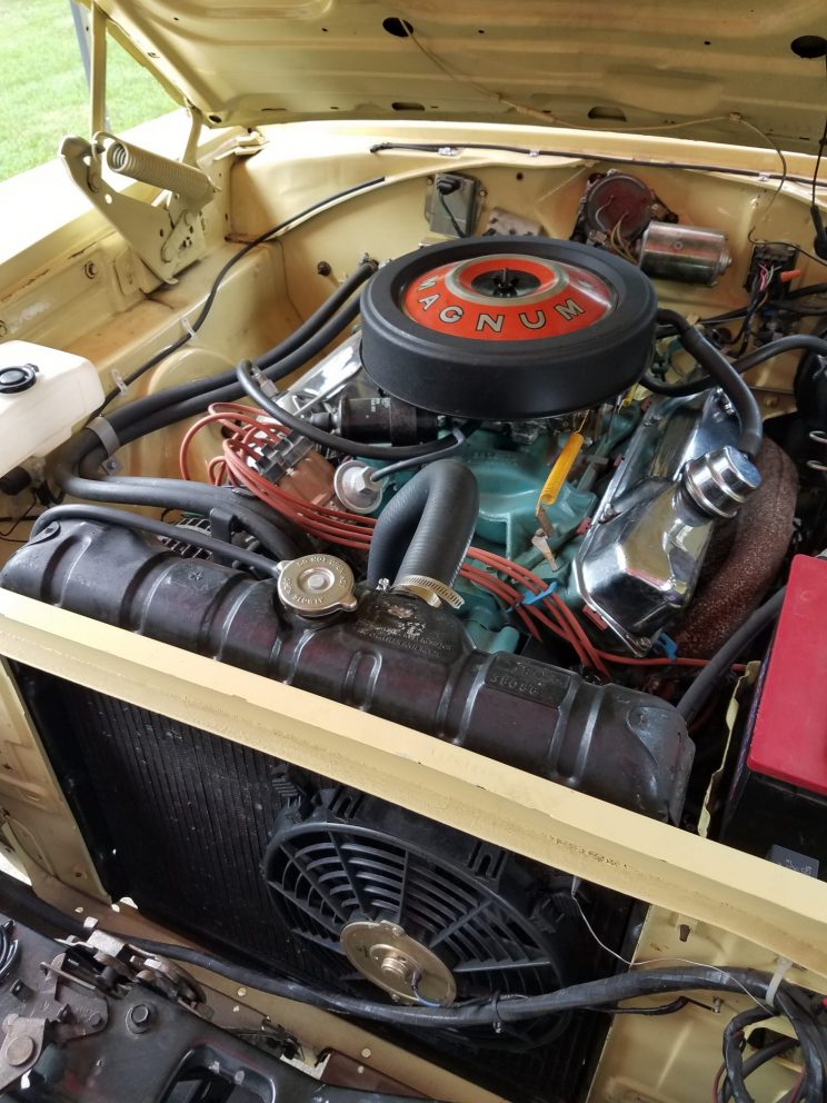 engine inside a vintage Dodge vehicle