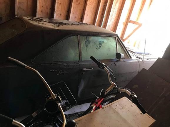 old car sitting in a garage