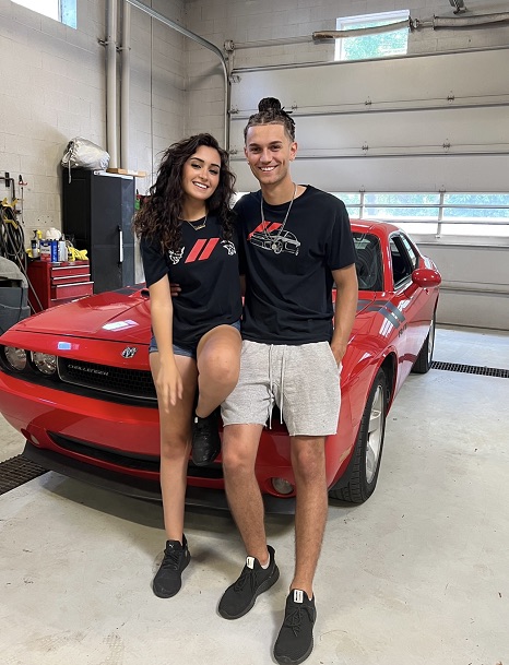 Christina Roki and Grant Sloan in front of barn