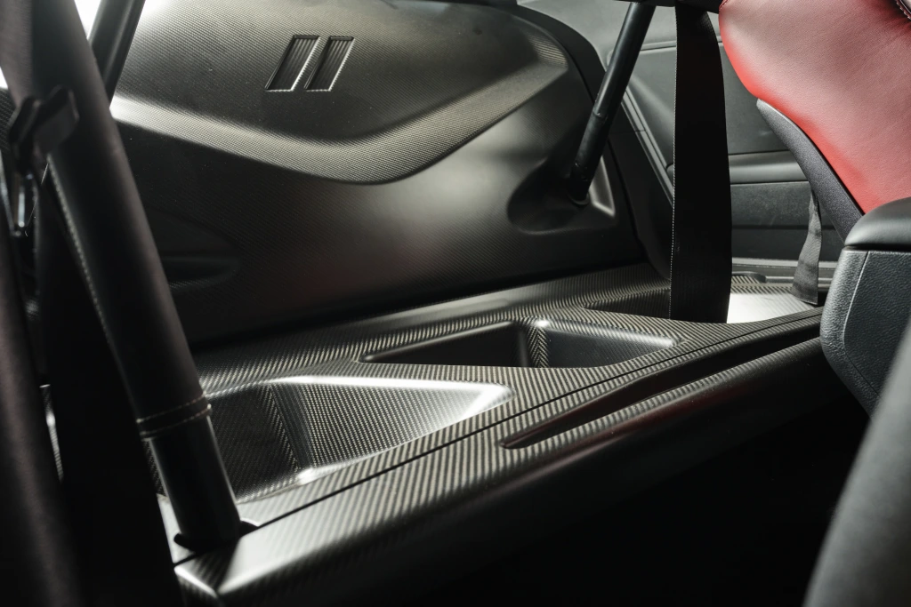 Direct connection rear seat delete carbon fiber closeout panels - image 1