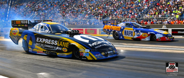 Two racecars racing at Route 66 Nationals