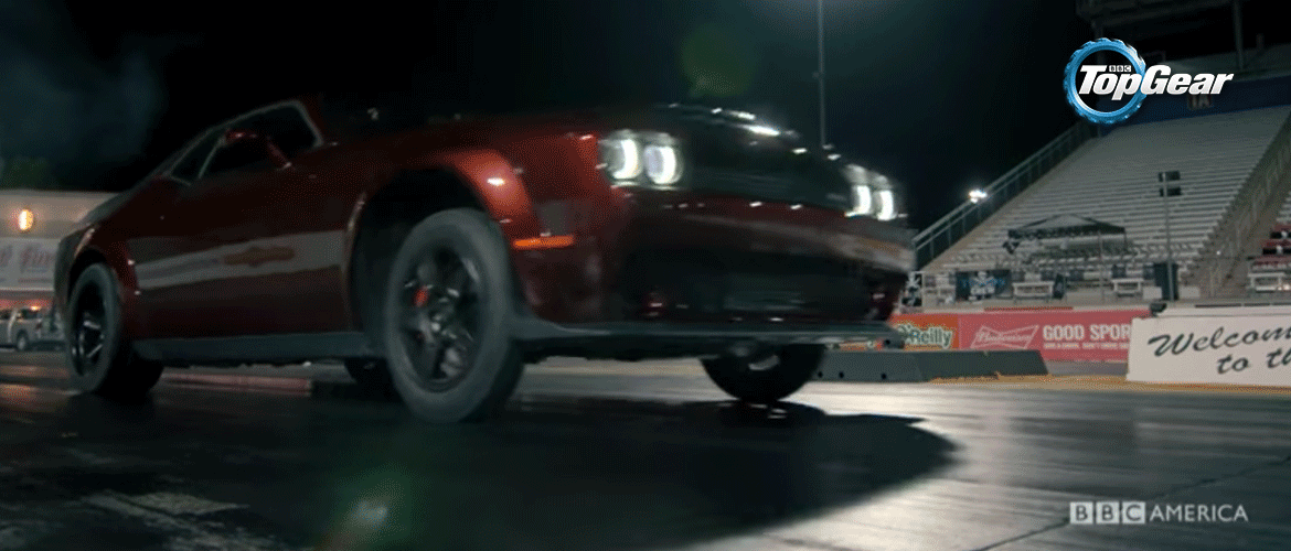 Red Dodge Demon launches wheelie