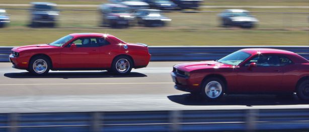 Two Dodge Challengers Racing