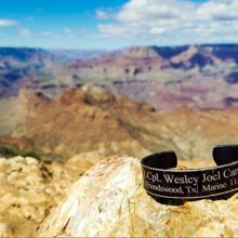 Shot of the Grand Canyon with a bracelet in memory of Marine Wesley Joel Canning