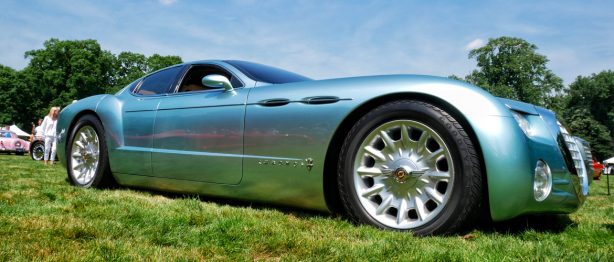 blue cool car parked on grass