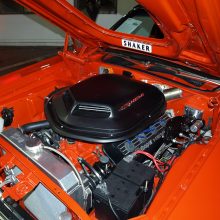 472 crate HEMI with dual Edelbrock 650s sits beneath the reproduction steel Shaker hood